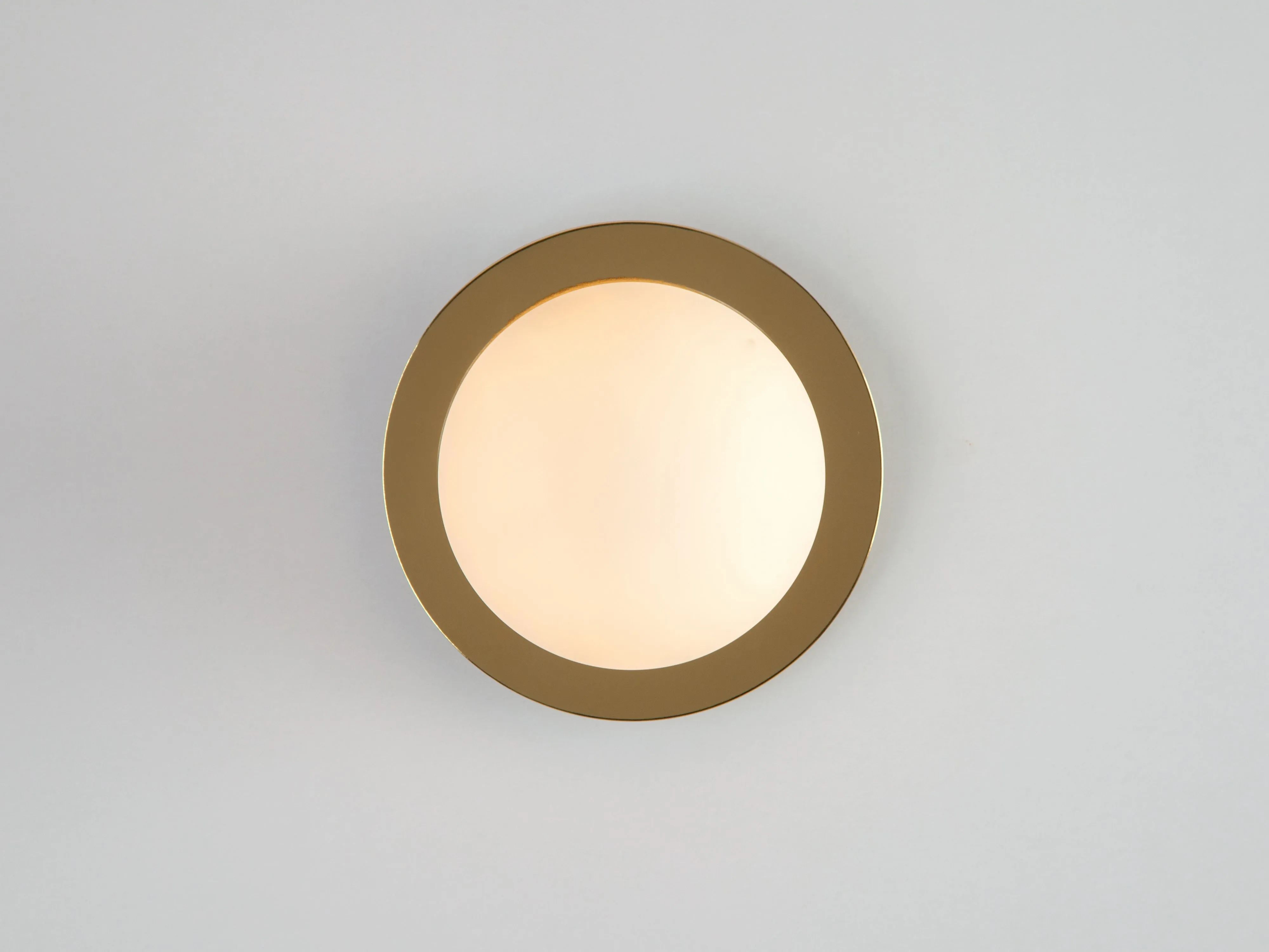 Brass opal disk wall light