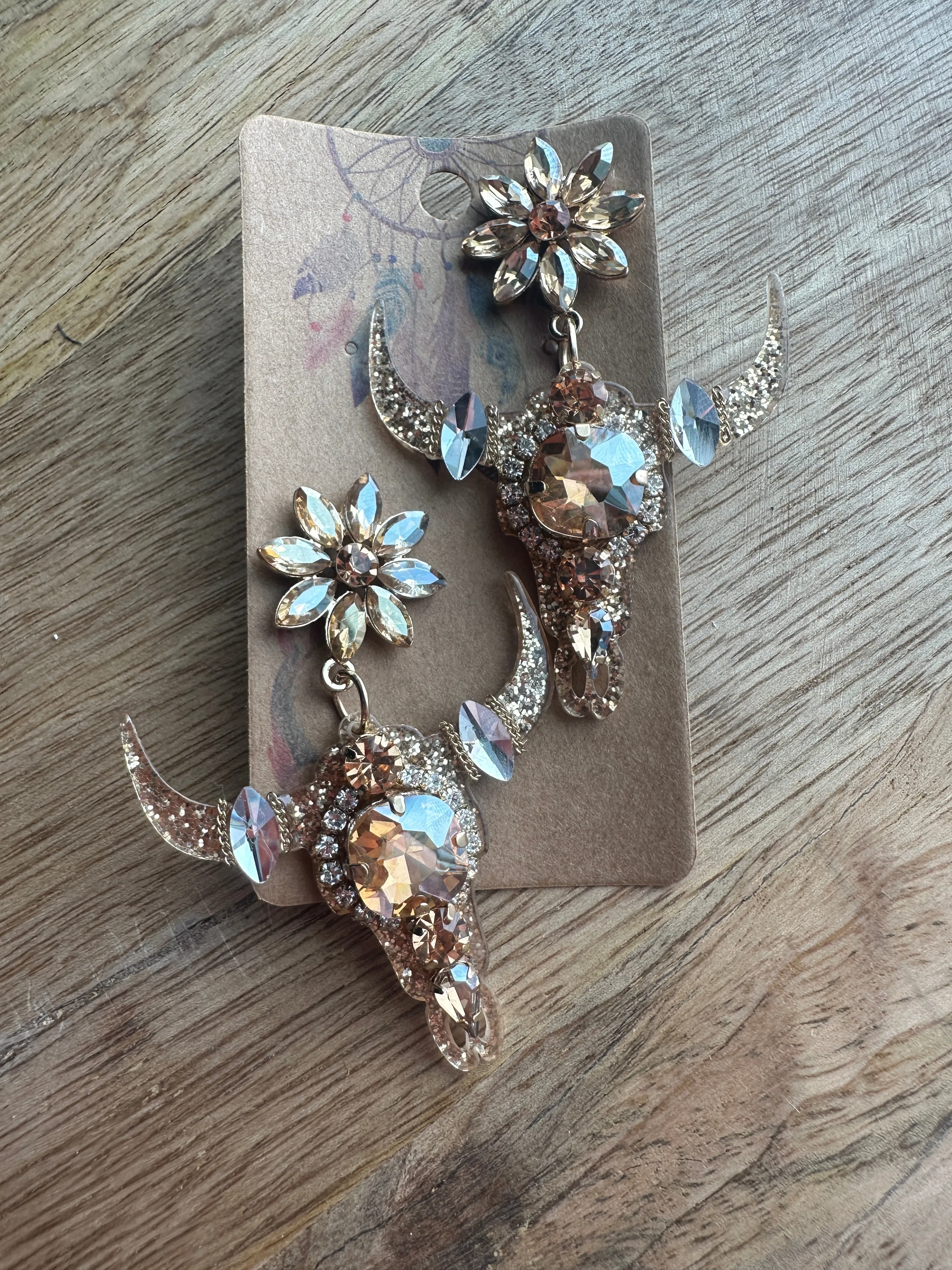 Glow Up Cow Skull Earrings