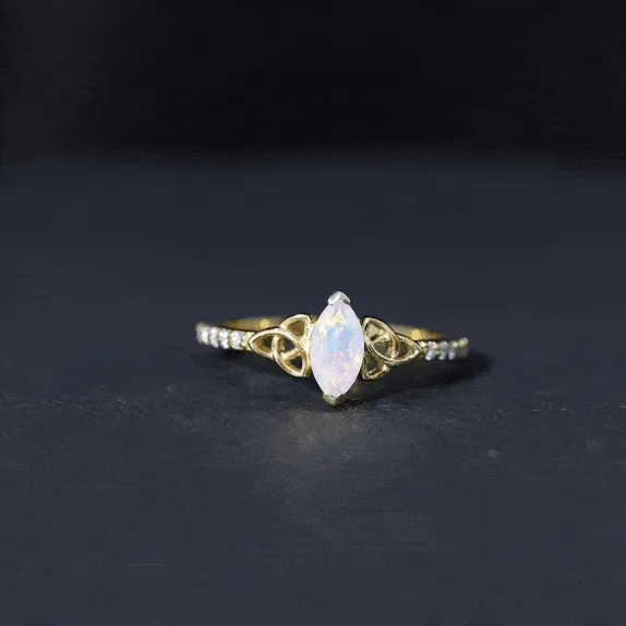Gold Celtic Knot Solitaire Ring with Marquise Cut Ethiopian Opal and Moissanite
