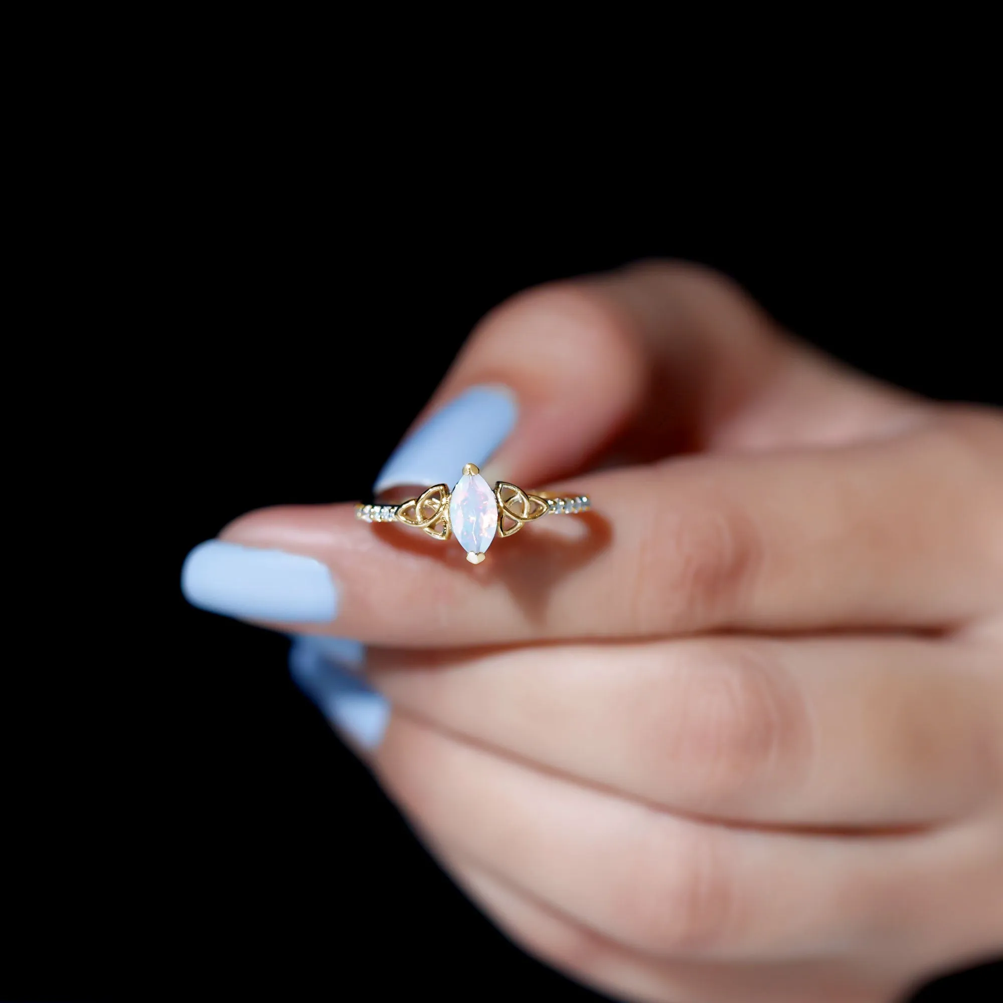Gold Celtic Knot Solitaire Ring with Marquise Cut Ethiopian Opal and Moissanite