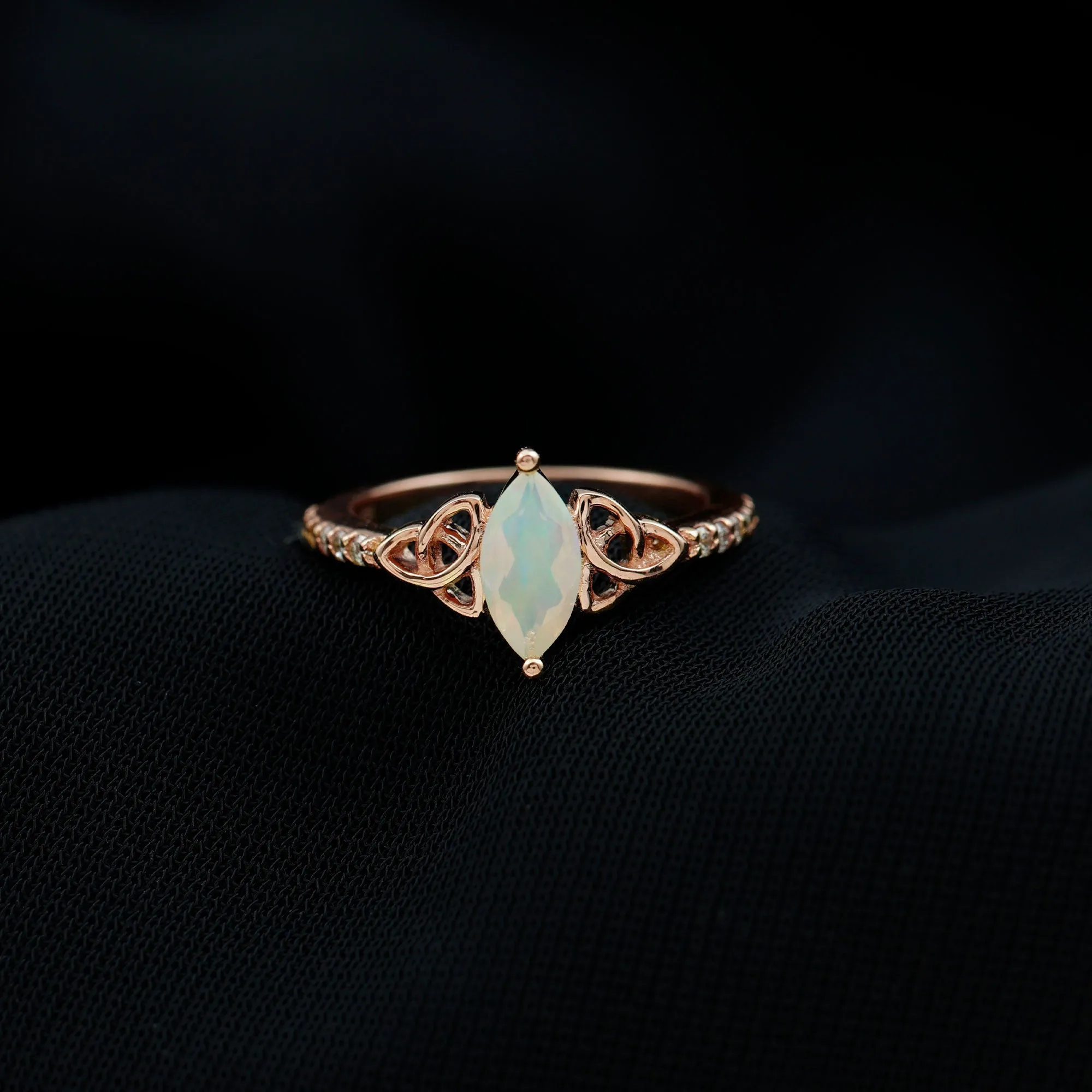 Gold Celtic Knot Solitaire Ring with Marquise Cut Ethiopian Opal and Moissanite