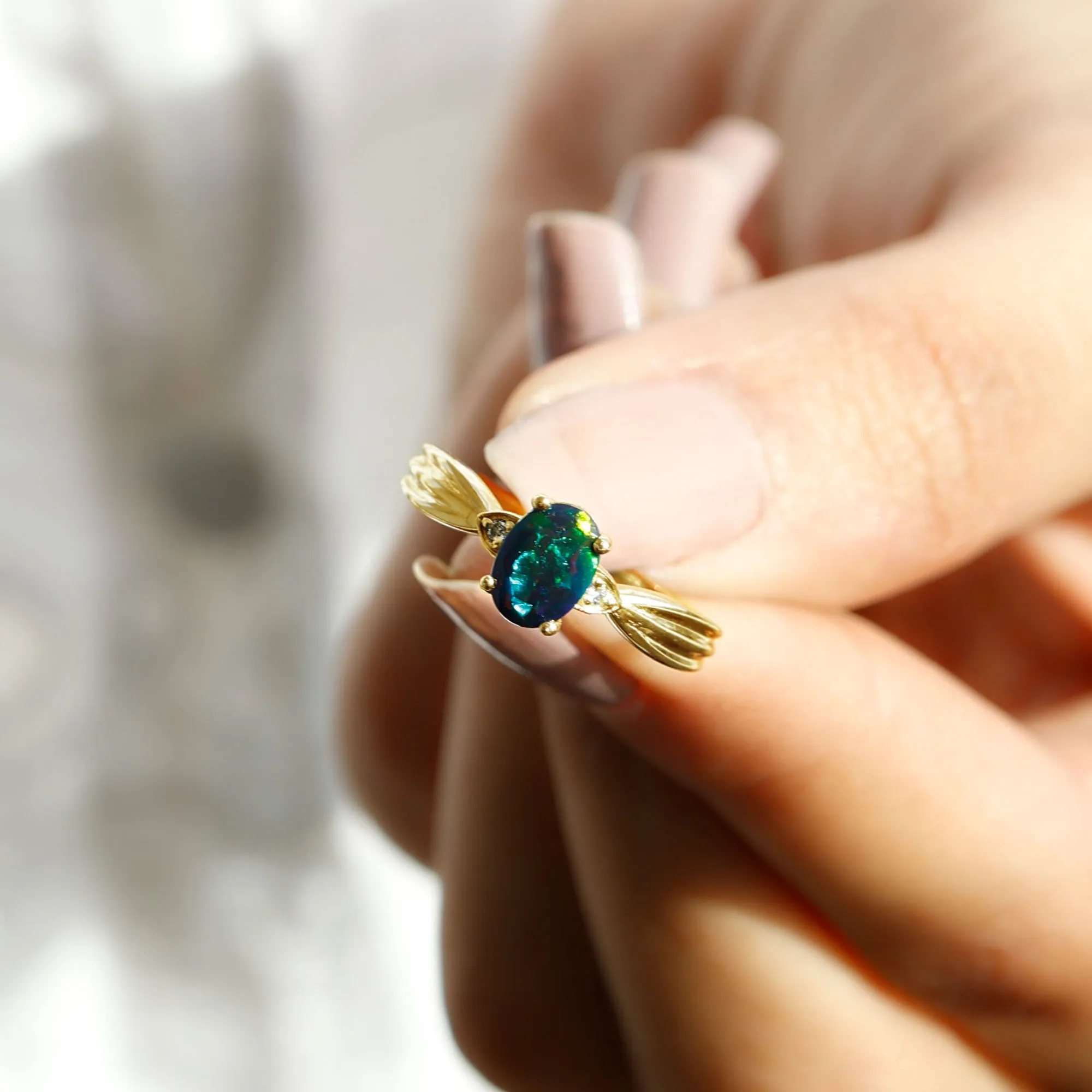 Oval Cut Real Black Opal Solitaire Ring with Diamond